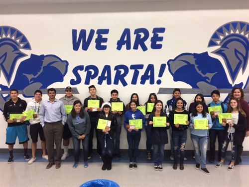 students receiving awards in the cafeteria